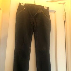 Black jeans with zipper pockets and legs
